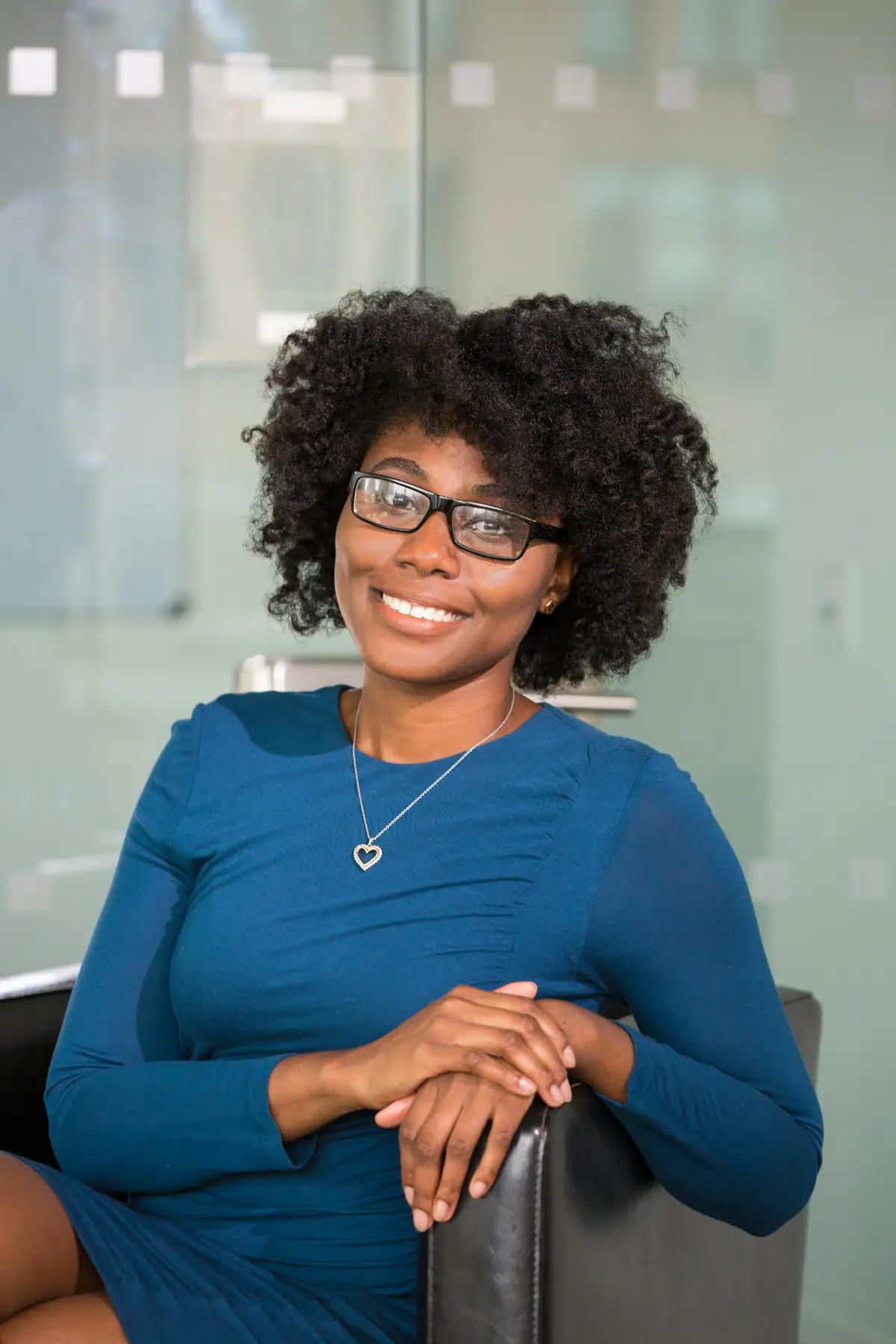 A friendly professional smiling in a bright office